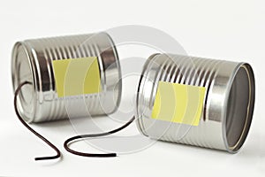 Tin cans phone with broken string and paper note - Communication photo
