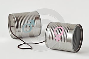 Tin cans phone with male and female gender symbol on white background - Gender communication concept