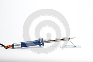 Tin soldering iron on white background