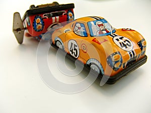 Tin toy racing cars