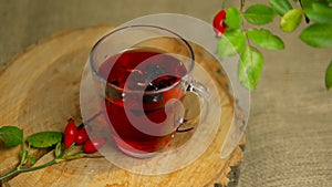 Tincture of herbs and red berries, tea from medicinal rosehip, homeopathy