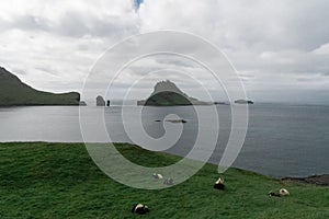 Tindholmur, view from Bour in Vagar island on the Faroe Islads