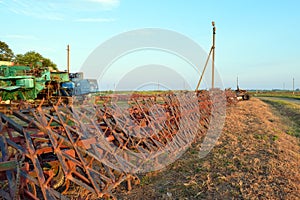 Tine harrow. Agricultural machinery and equipment. photo