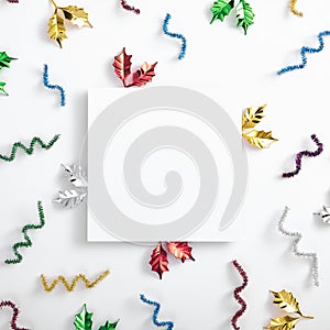 Tinsel on white background. Party pattern with glitter, stars and tinsel. White empty paper with party elements. Tinsel for