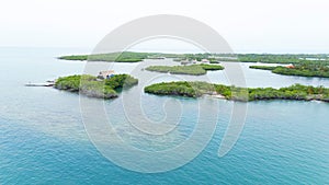 Tintipan Island seen from the air in the middle of the ocean in the San Bernardo Archipelago, Colombia photo