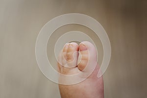 Tiny baby foot close up