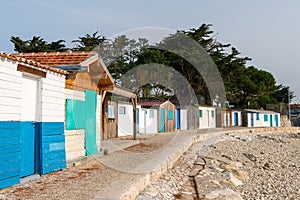 Tiny colorful houses made of wood on the beach