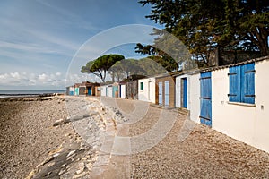 Tiny colorful houses made of wood on the beach