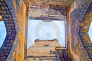 In tiny court of Mala Strana Bridge Tower, Charles Bridge, Prague, Czech Republic