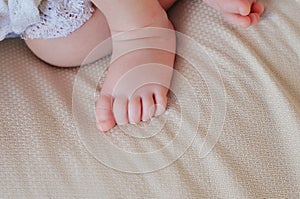 tiny foot of newborn baby