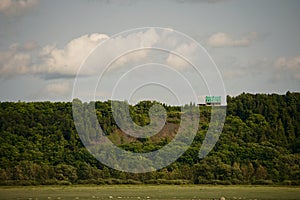 Tiny green house on the hill