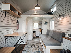 Tiny house interiors optimized with space saving solutions
