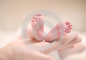 Tiny newborn baby's feet