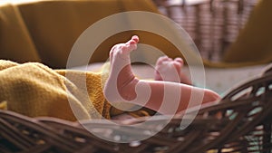 Tiny newborn baby's feet closeup. Mom and her child. Happy family concept. Beautiful conceptual video of maternity.