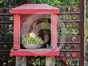 Tiny roadside shrine in Myanmar