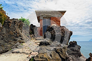 A tiny shed on a rocky cliff of Alicudi island.