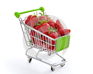 Tiny shopping cart filled with strawberries