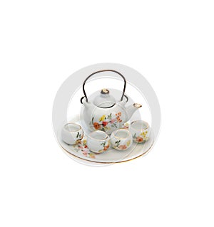 Tiny souvenir teapot with bowls