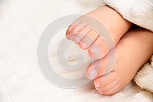 Tiny toes in bed