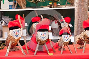 Tio de Nadal on Christmas market photo
