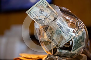 Tip jar with a 20 as gratuity photo