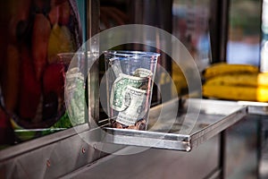Tip jar at food cart