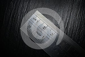 Tip of the material metal ruler