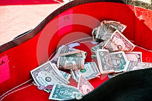 Tip money in guitar case