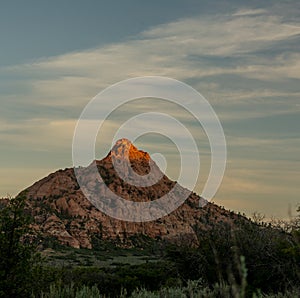 Tip Of Red Butte Glows With Evening Light In Zion