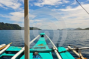 Tip of a wooden filipino Boat Facing the blue