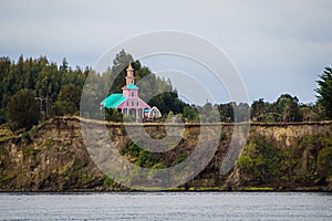 Tipical wood made church in Chiloe island, Chile. Patagonia, vie photo