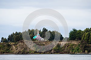 Tipical wood made church in Chiloe island, Chile. Patagonia, vie photo