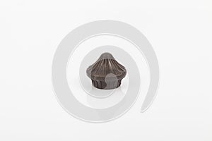 Tips of brown plastic for curtain poles on white background