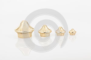 Tips golden for curtain poles on white background