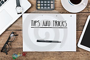 Tips, tricks on notebook on Office desk with computer technology