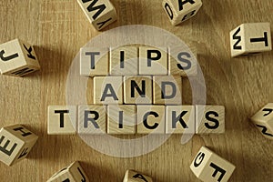 Tips and tricks text from wooden blocks