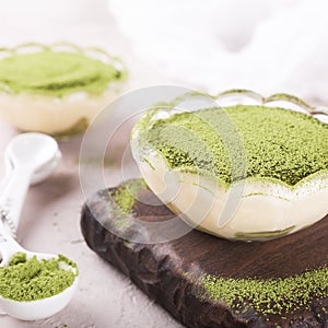 Tiramisu cake with green matcha tea