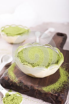 Tiramisu cake with green matcha tea