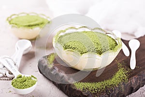 Tiramisu cake with green matcha tea