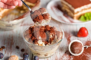 Tiramisu dessert in glasses. Side view