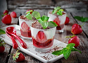 Tiramisu with fresh strawberries in a glass