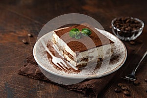 Tiramisu. Traditional italian dessert on white plate