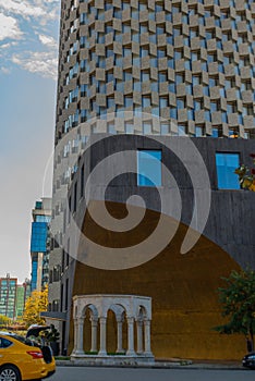 TIRANA, ALBANIA: Tomb of Kaplan Pasha and the Hotel Plaza. TID tower is the tallest skyscraper in Albania.