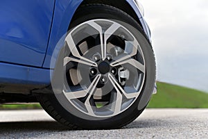 Tire and alloy wheel on this passenger car