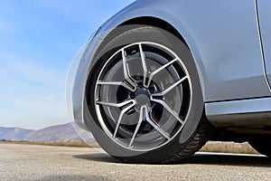 Tire and alloy wheel on this passenger car