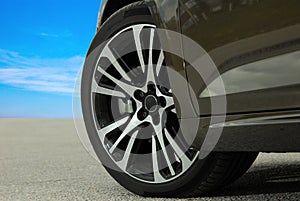 Tire and alloy wheel on this passenger car