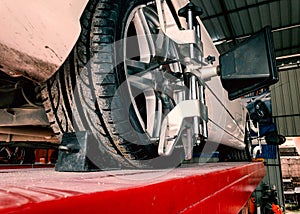 Tire clamped with lazer aligner