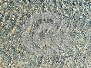 Tire marks in the sand - picture,Tire`s tracks print in Sand photo