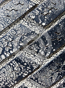 Tire painted white close-up on a sunny day.