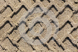 Tire pattern on sand.